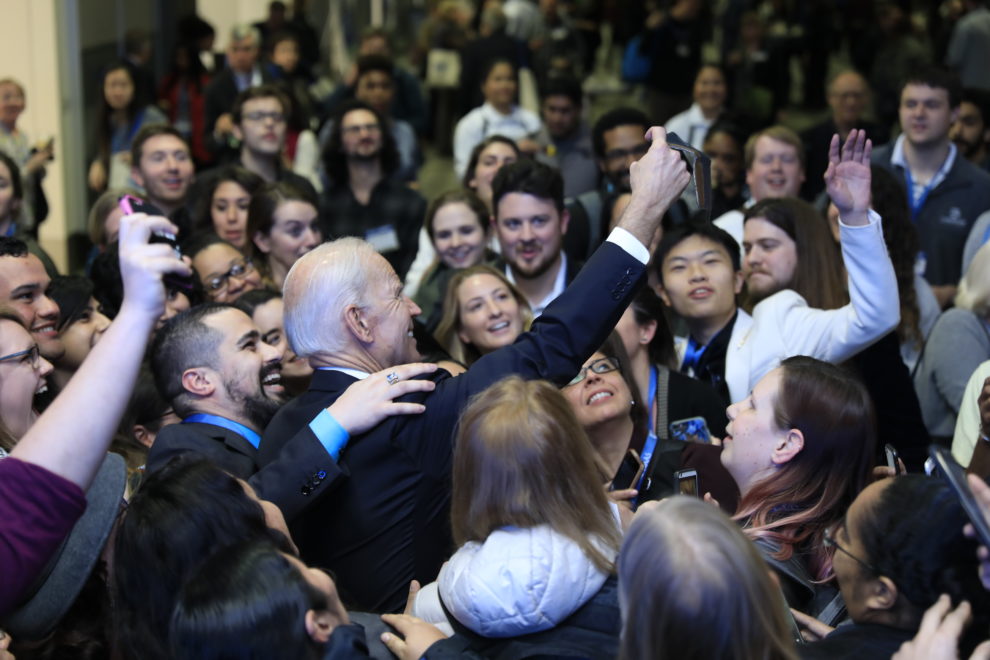Joe Biden taking a selfie with attendees at the AAAS convention in Austin