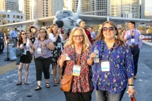 Female attendees at event on the USS Midway in San Diego
