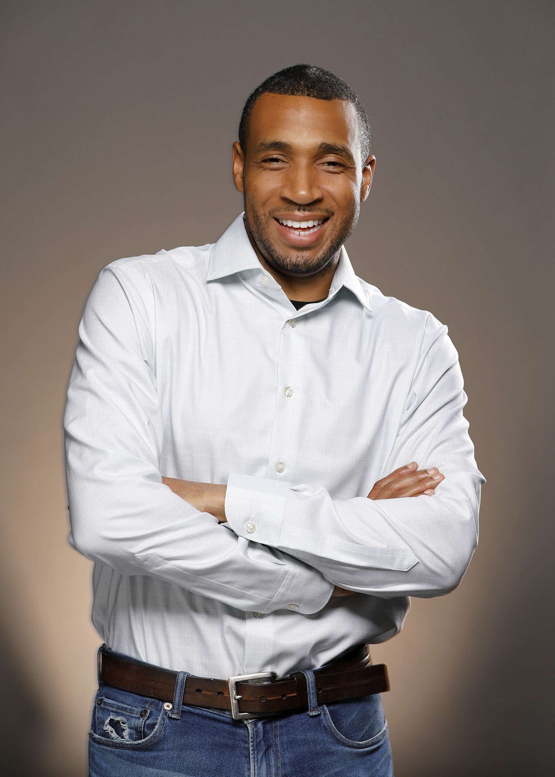Smiling Black Man posing for Business Headshot