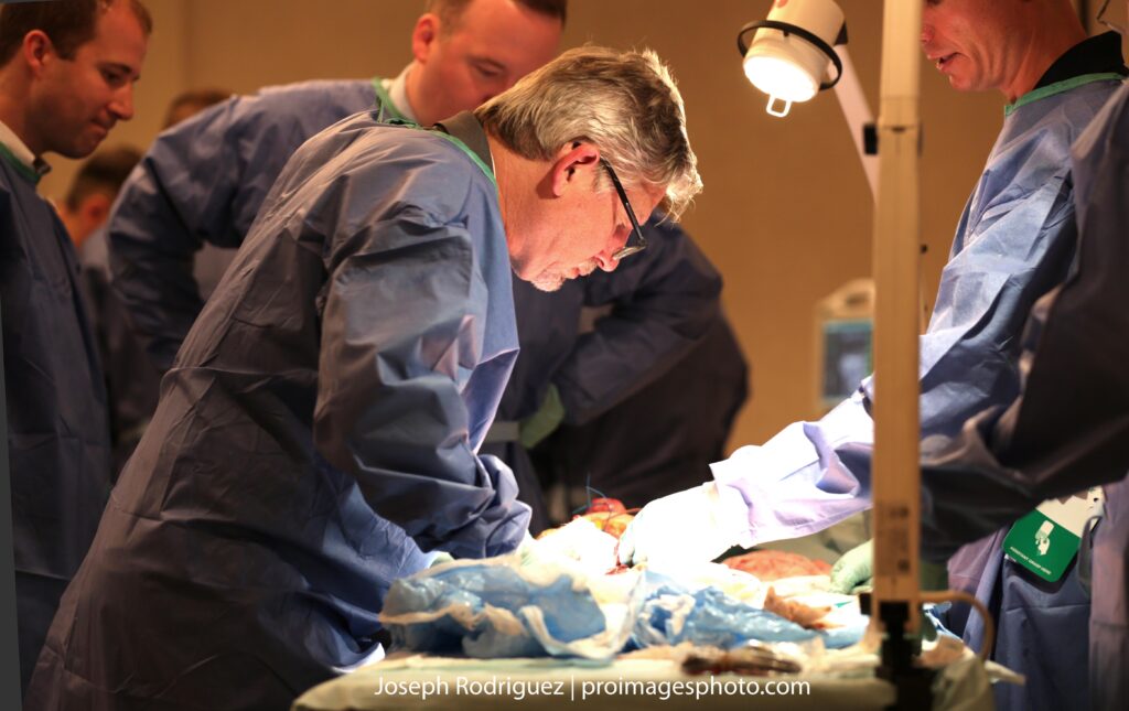 Chicago Event and Convention Photography of Healthcare and Medical doctors working on cadaver leg.
