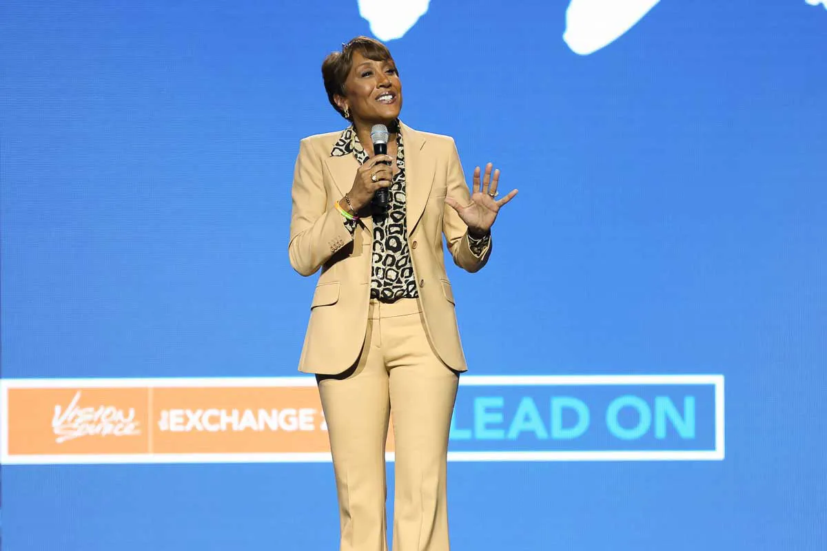 San Diego conference keynote photography capturing Robin Roberts presenting on a branded stage at Vision Source Exchange.