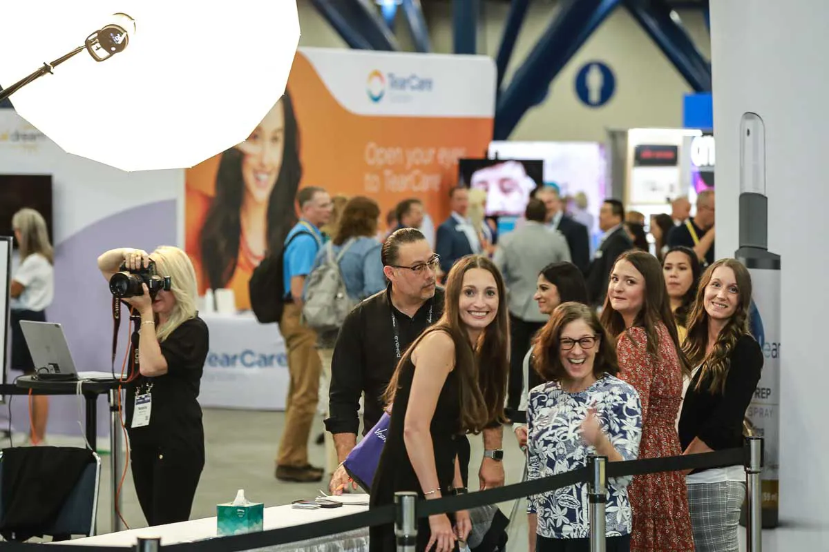 Convention headshot station running on the show floor in San Diego, part of the nationwide headshot lounge service we bring to conferences and trade shows